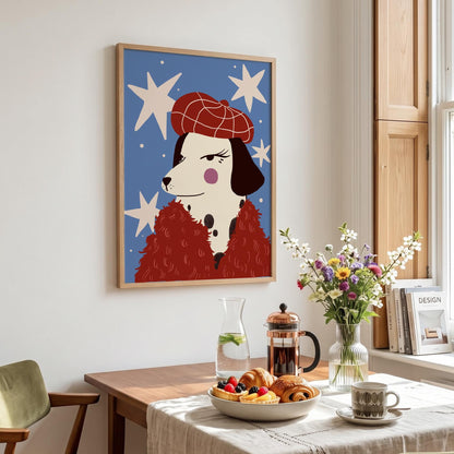 May include: A framed art print featuring a Dalmatian dog wearing a red beret and a red fluffy scarf against a blue background with white star shapes. The dog has black spots and a pink cheek.