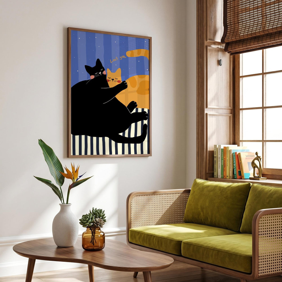 May include: A framed art print featuring a whimsical illustration of two cats. One black cat hugs an orange cat, with the words "Love you" above them. The background has blue vertical stripes and stars, with a black and white striped base.
