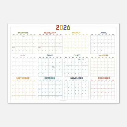 May include: A 2026 yearly calendar with a white background. Each month is displayed in a separate box, with the month's name at the top. The year 2026 is written in colorful letters. The calendar is designed for planning and scheduling.