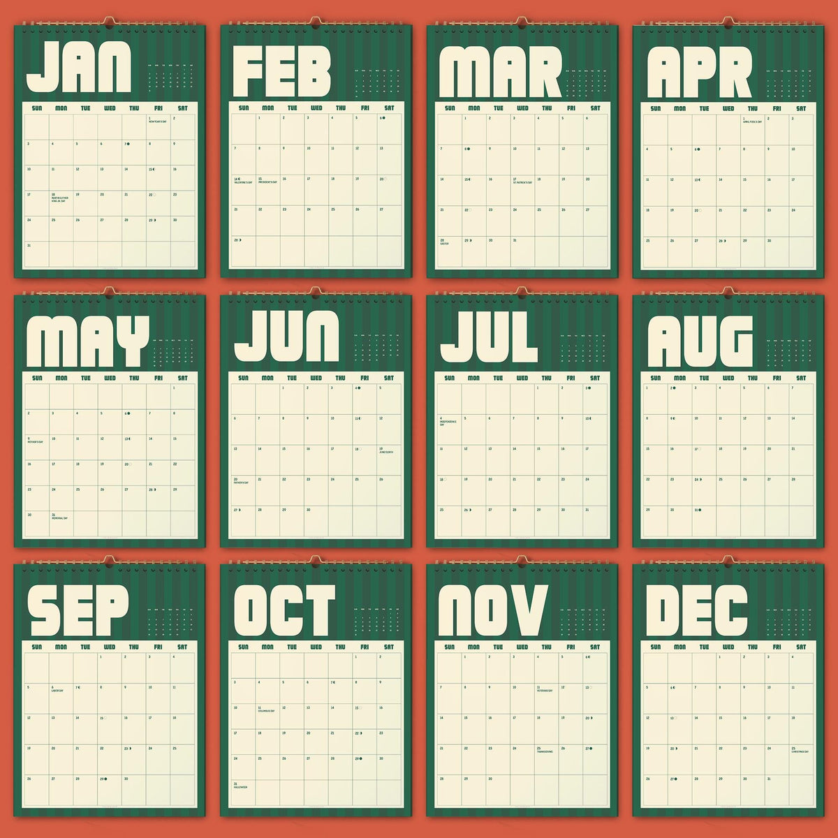 May include: A twelve-month wall calendar featuring a dark green background with vertical stripes and cream-colored grid pages. Each month is labeled with bold, rounded white lettering from JAN to DEC, displaying a standard seven-column grid layout.