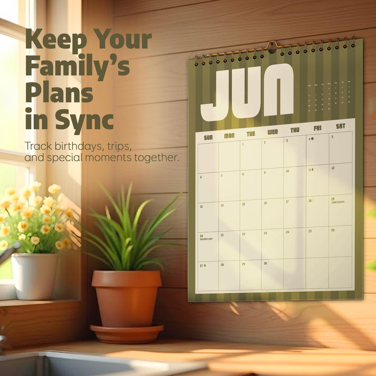 May include: A wall calendar for the month of June featuring a green and cream striped background with the text "Keep Your Family's Plans in Sync" and "Track birthdays, trips, and special moments together." The calendar has a wire-bound top.